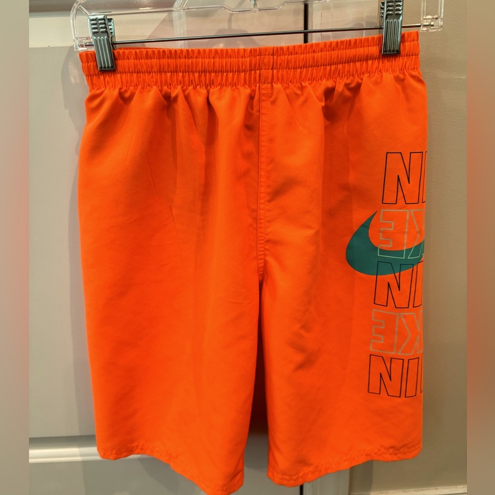 Nike boys youth XL swim suit with front tie, mesh liner and velcro back pocket